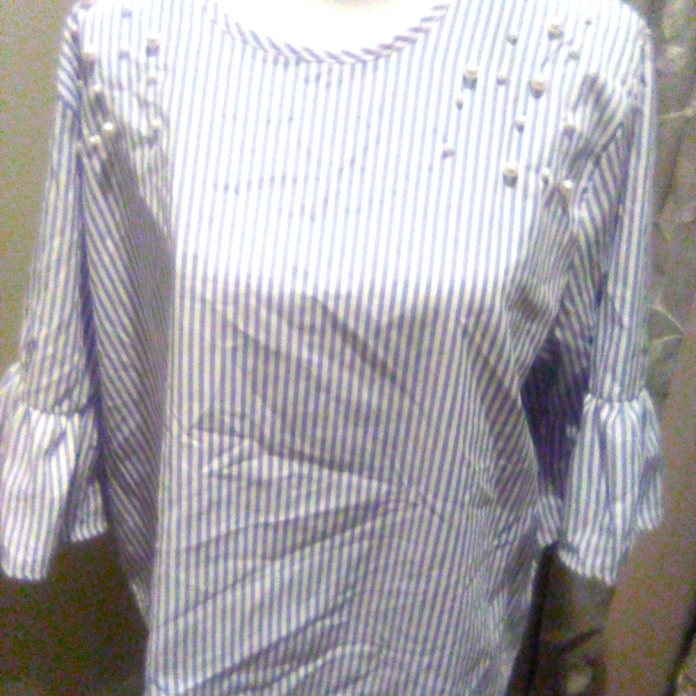 Brand new Flores ruffled sleeve pearl blouse